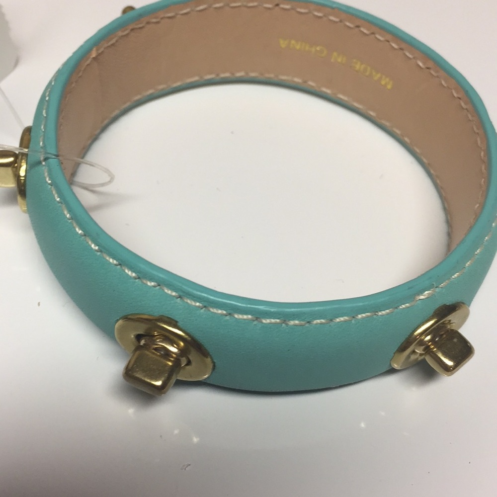 Coach leather bracelet with grommets. Rare NWT